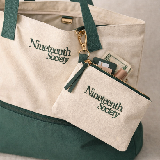 The Round Bag detail shot with branded pouch and gold hardware — golf accessories | Nineteenth Society