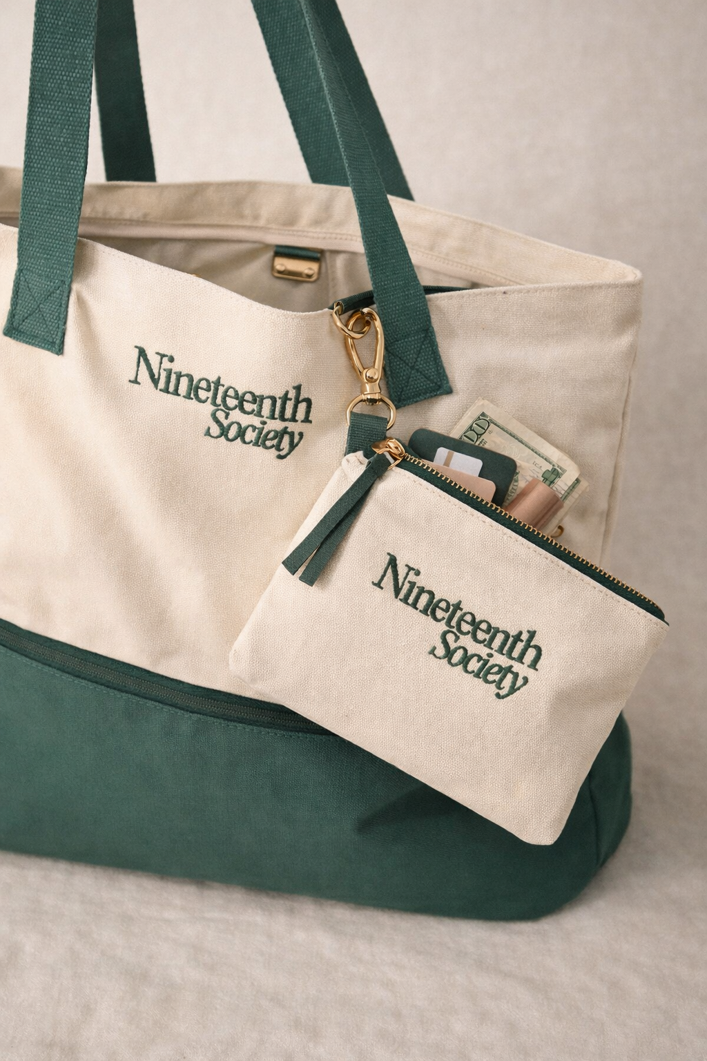 The Round Bag detail shot with branded pouch and gold hardware — golf accessories | Nineteenth Society